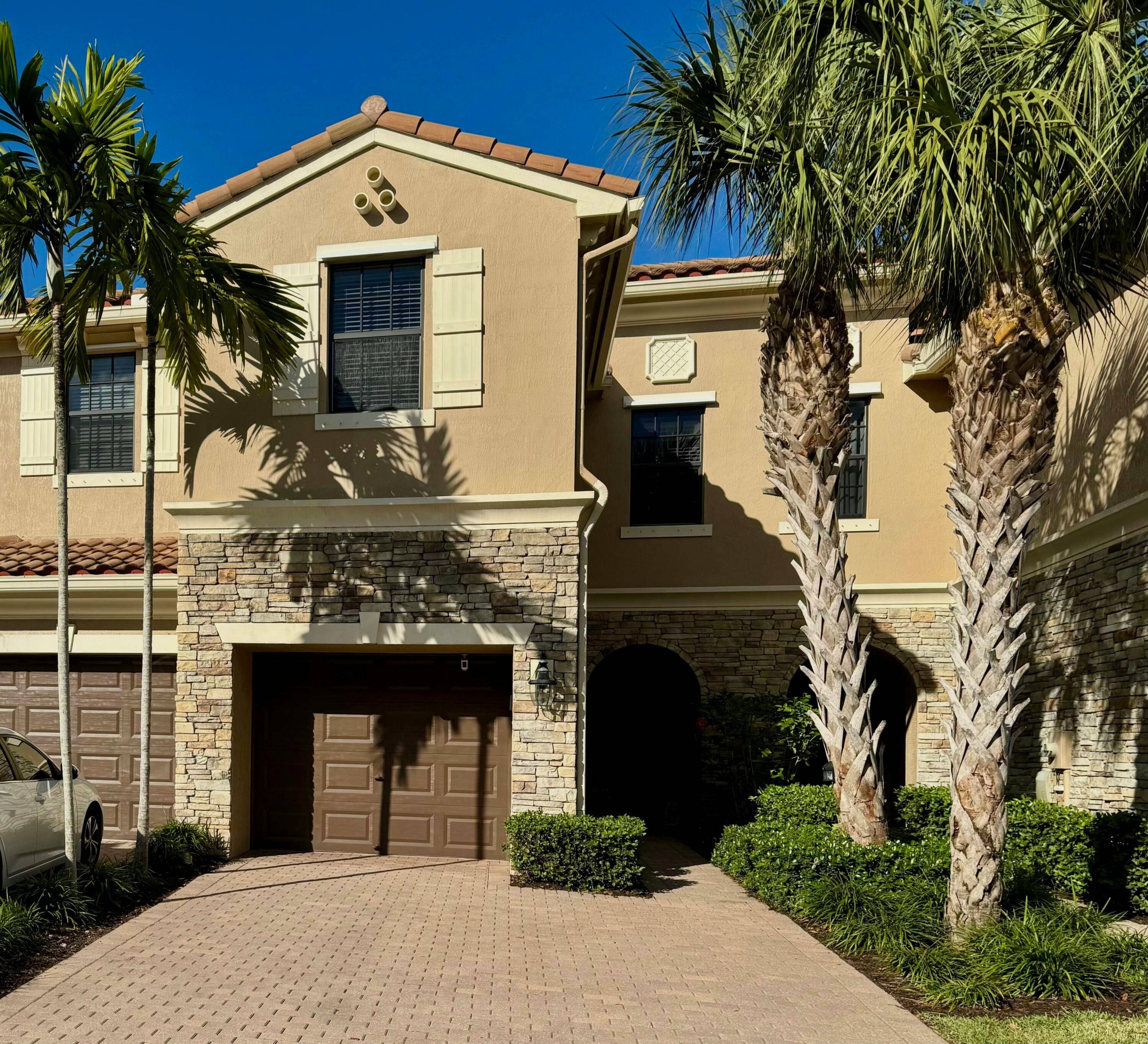 Discover the largest and most desirable three bedroom model in the exclusive, gated community of Wellington Parc.