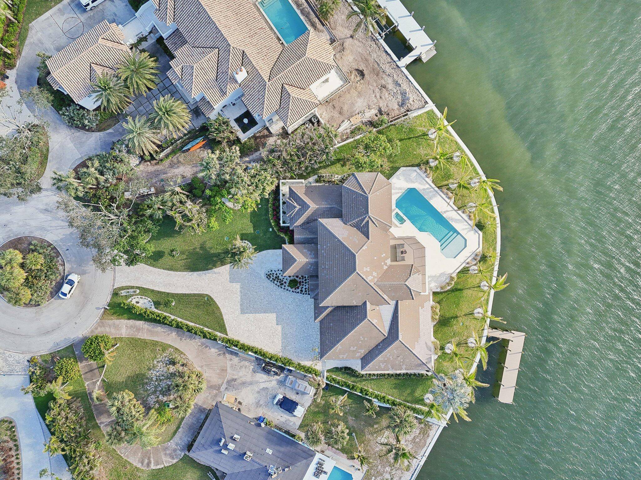 Discover a transitional coastal masterpiece that epitomizes luxury, space, privacy, and sophistication.