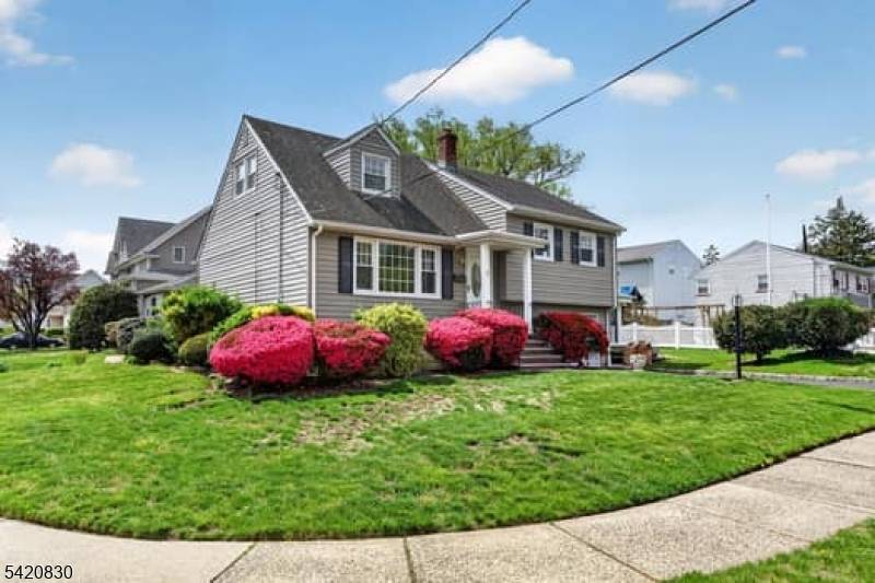 Welcome to this charming split level home, perfectly positioned on a corner lot in the highly sought after Patricia Place neighborhood of Clifton, New Jersey.