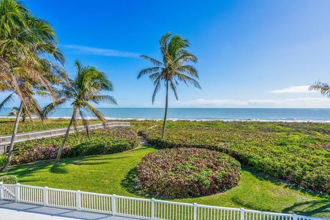 Direct OCEANFRONT home in a private gated community located on a sprawling ACCRETING beach, offering an ideal canvas for building new or renovating.