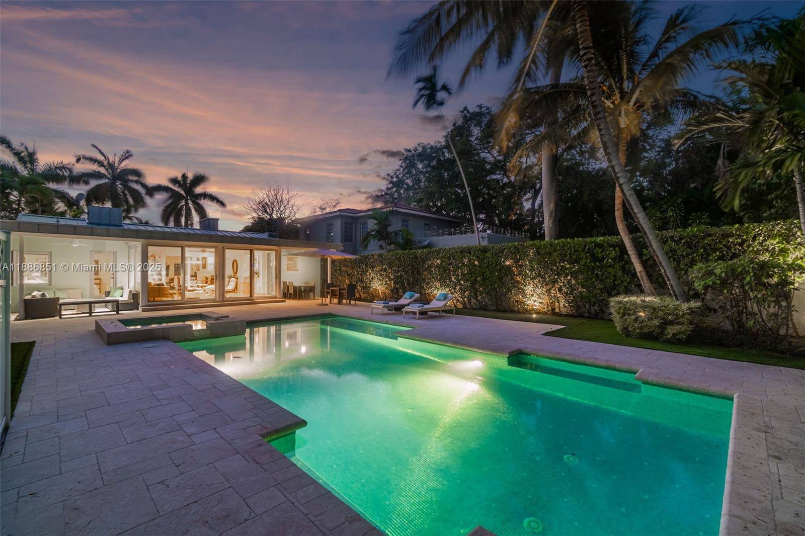 Fabulously carefree with iconic South Beach moods, this Bayshore daydream blends mid century modern simplicity with nostalgic sea spray hues, bespoke finishes, and curated sightlines of your Art Deco pool.