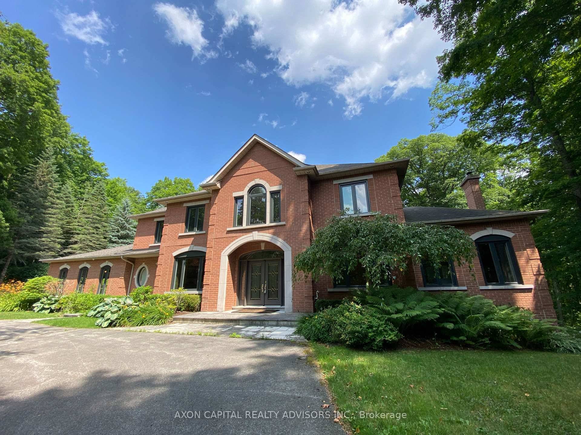 Nestled at the end of a quiet court and backing onto 26 acres of protected forest, this stunning 5 2 bedroom estate offers close to 5, 000 sq.