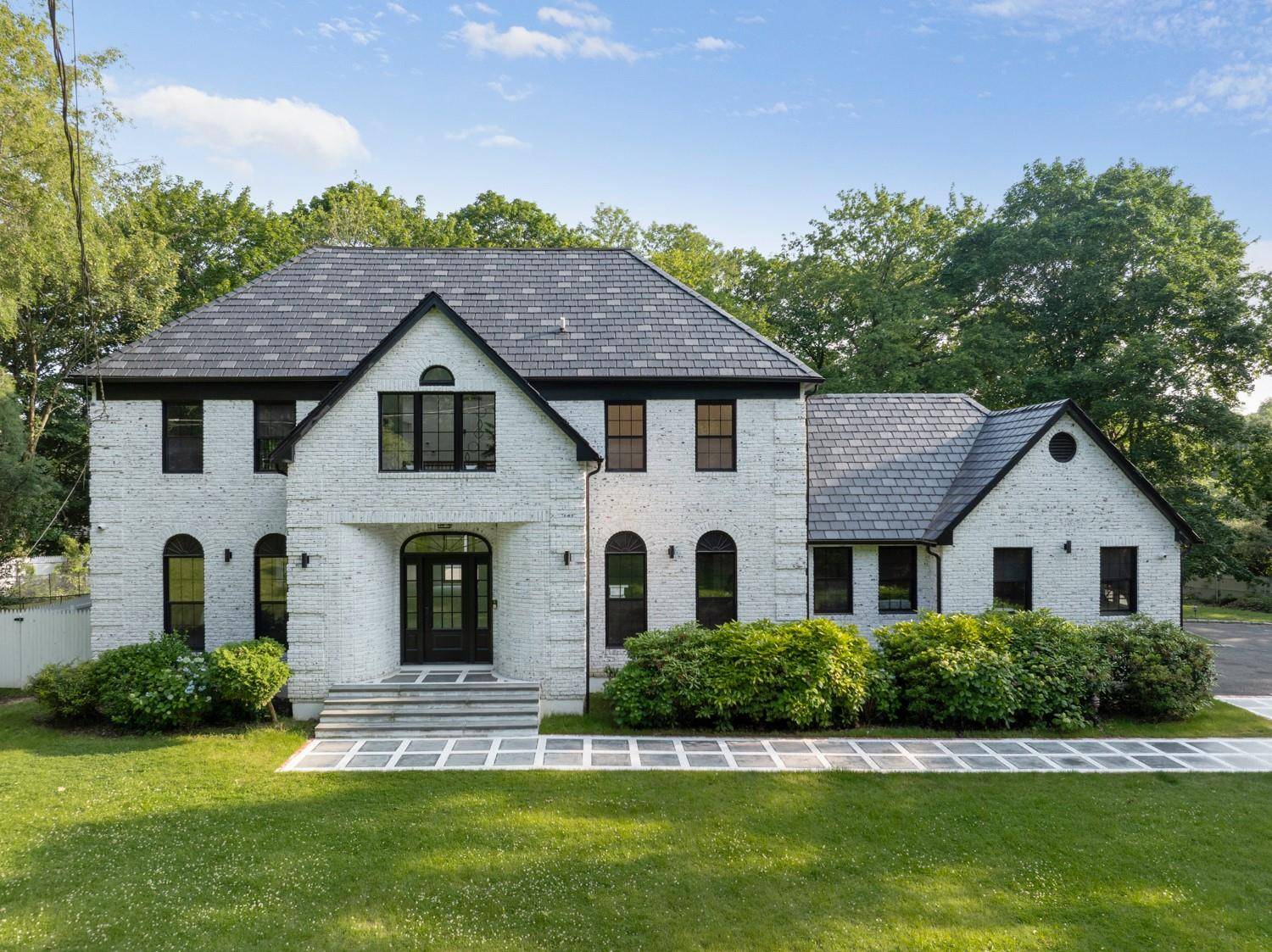 Welcome to a rare opportunity to own a fully renovated and extended estate rebuilt from the studs up and reimagined for modern luxury in the heart of one of Long ...