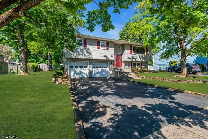 Welcome home to this light filled bi level nestled in a desirable Middlesex neighborhood.