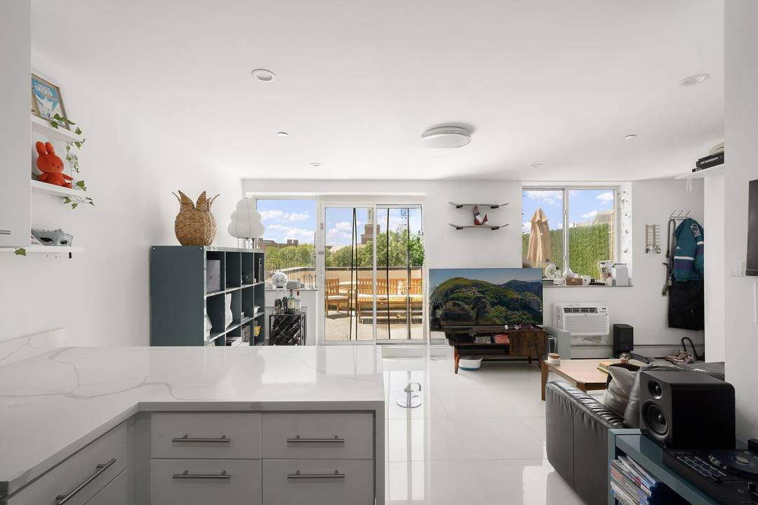 Welcome to 145 Kenilworth Place 6A a bright, top floor one bedroom condo featuring two expansive outdoor spaces in a boutique elevator building on a quiet, tree lined block in ...