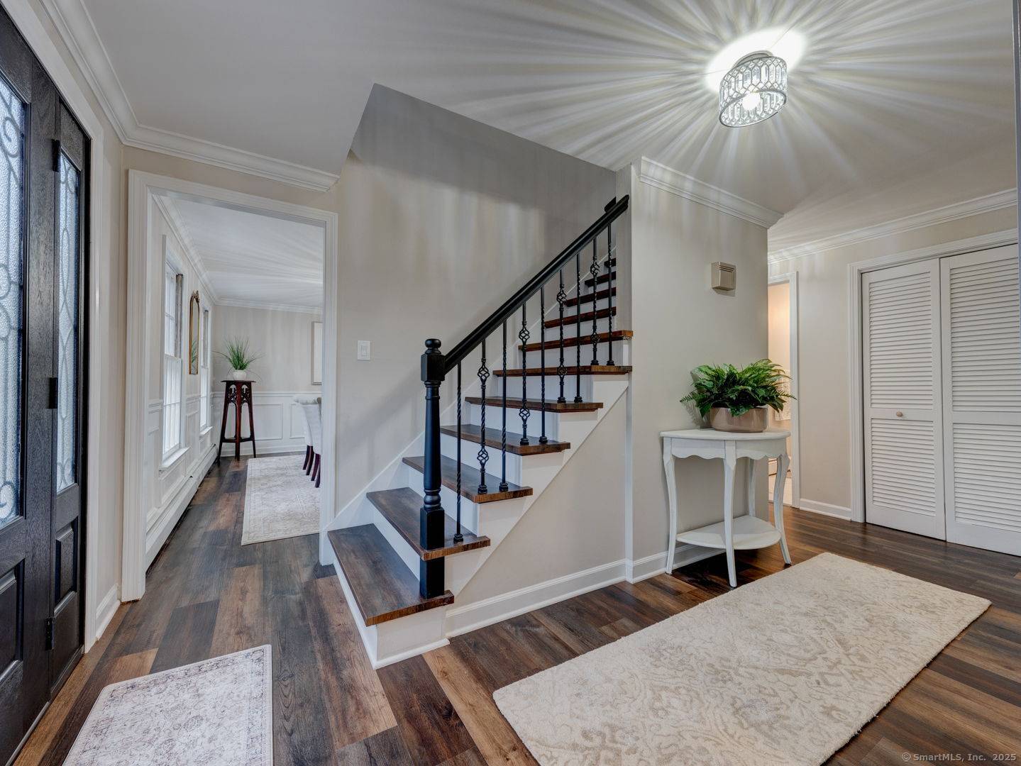 Welcome to 143 Juniper Drive in Avon, CT, a beautifully remodeled home featuring a brand new kitchen with updated appliances, new laminate flooring throughout, and a cozy family room with ...