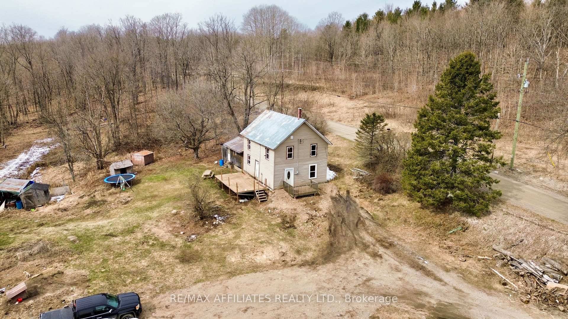 This charming 3 bedroom, 1 bathroom home is located on a municipally maintained road and sits on a beautiful 3.