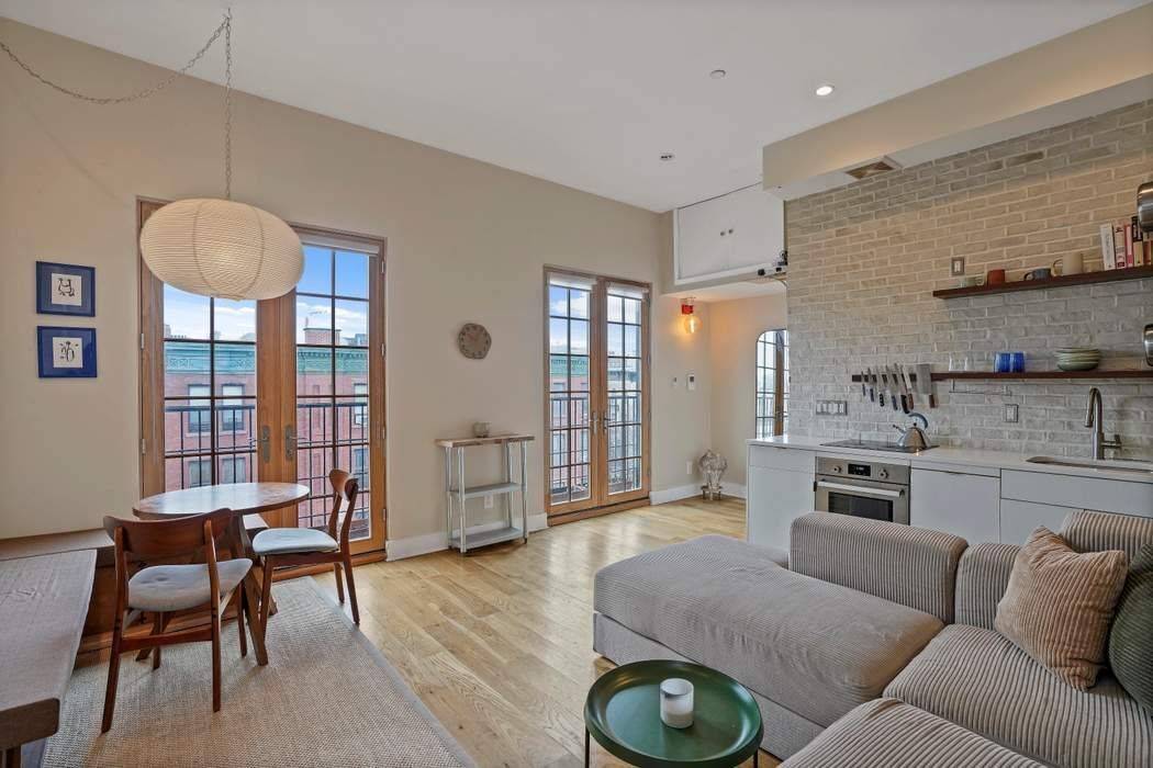 Residence 4B at 210 Pulaski Street presents a generously scaled, loft like home designed for both comfort and versatility complete with a deeded private rooftop oasis that elevates everyday Brooklyn ...