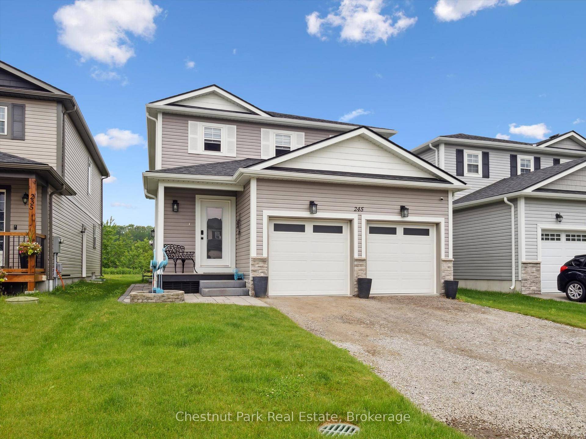 Welcome to 245 Wild Rose Drive This beautifully maintained, five year new two storey home is nestled in a desirable, family friendly neighbourhood.