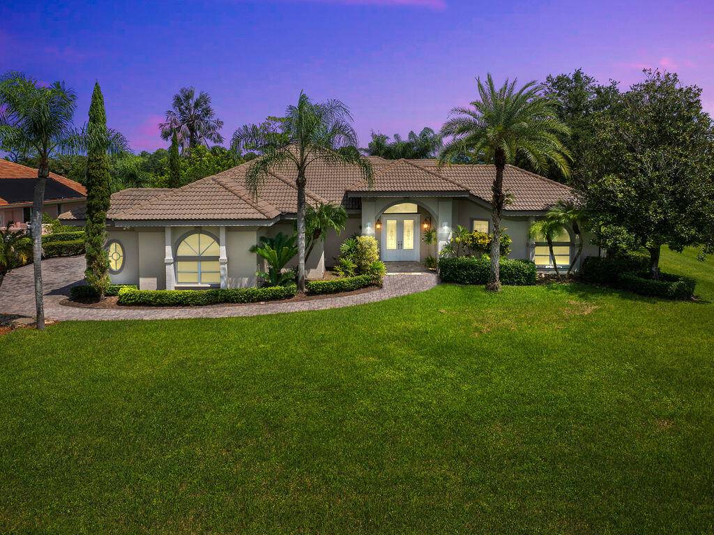 Welcome to 10255 SW Stones Throw Terrace, an exceptional residence located in the highly sought after gated golf community of Cobblestone in Palm City.