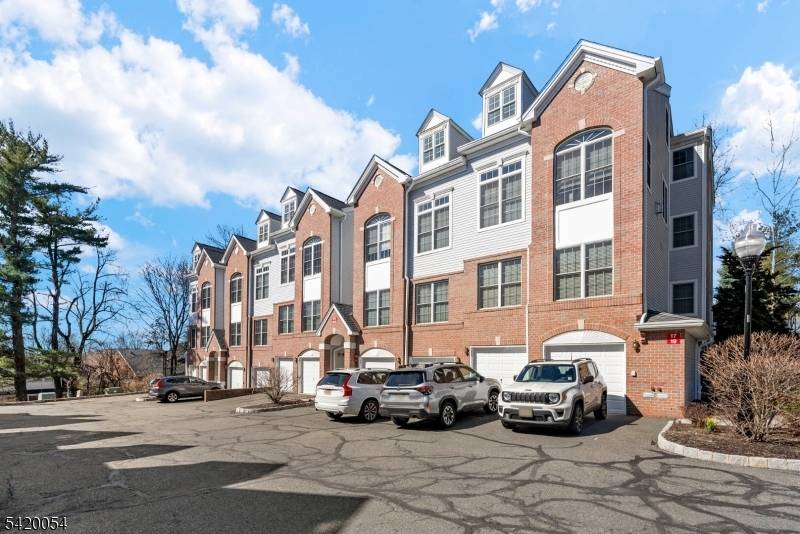 Welcome to 9 Gothicel Brook Court, a rare opportunity to own a beautifully maintained townhouse in one of Hawthorne's most desirable private communities.