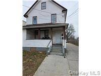 This bright second floor apartment features fresh paint, a kitchen and bathroom, and durable vinyl flooring that s easy to clean.