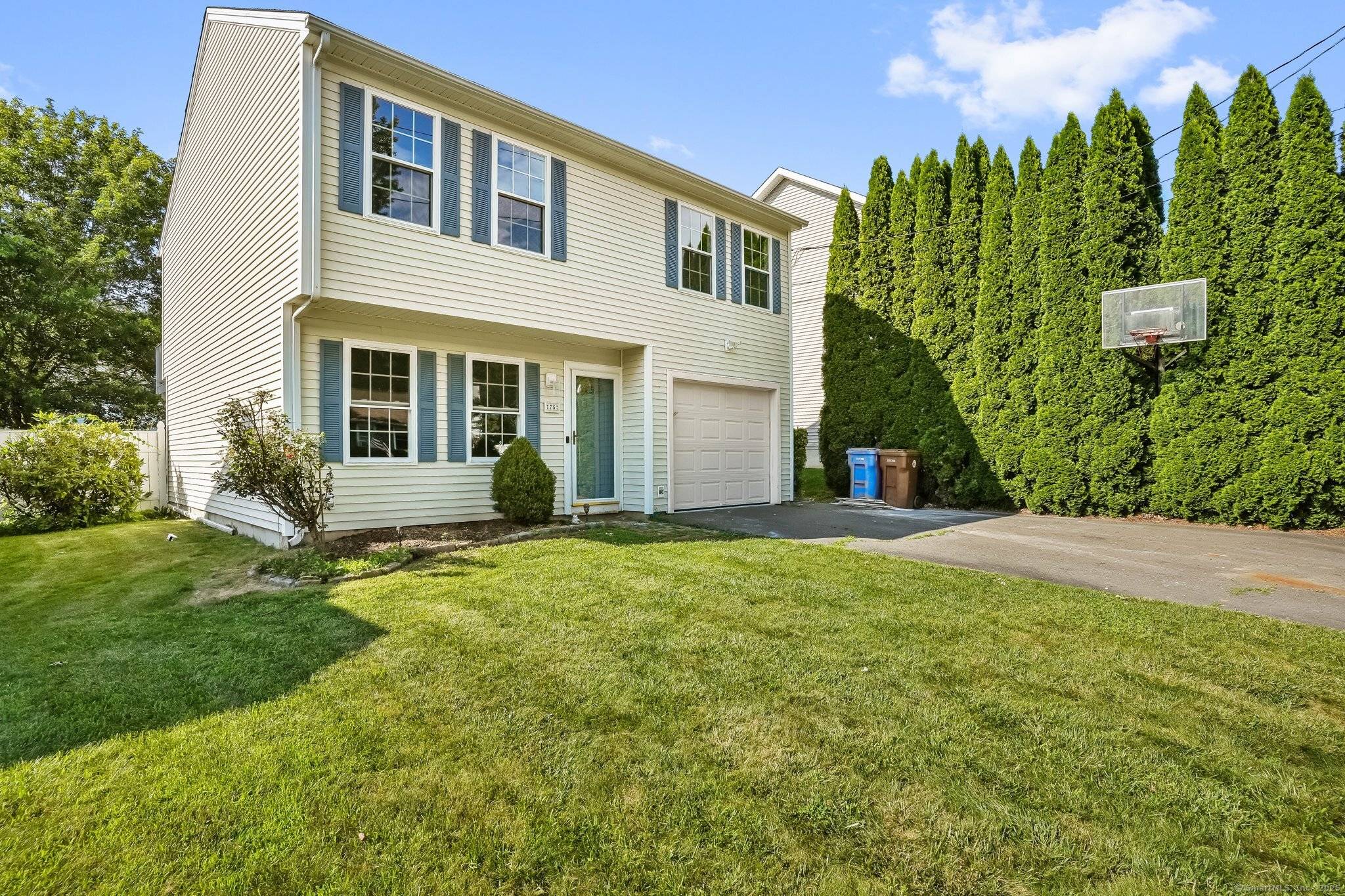 Welcome to 75 Beecher Avenue, a beautifully crafted home built in 2001, located in a peaceful Shelton neighborhood on a quiet street.