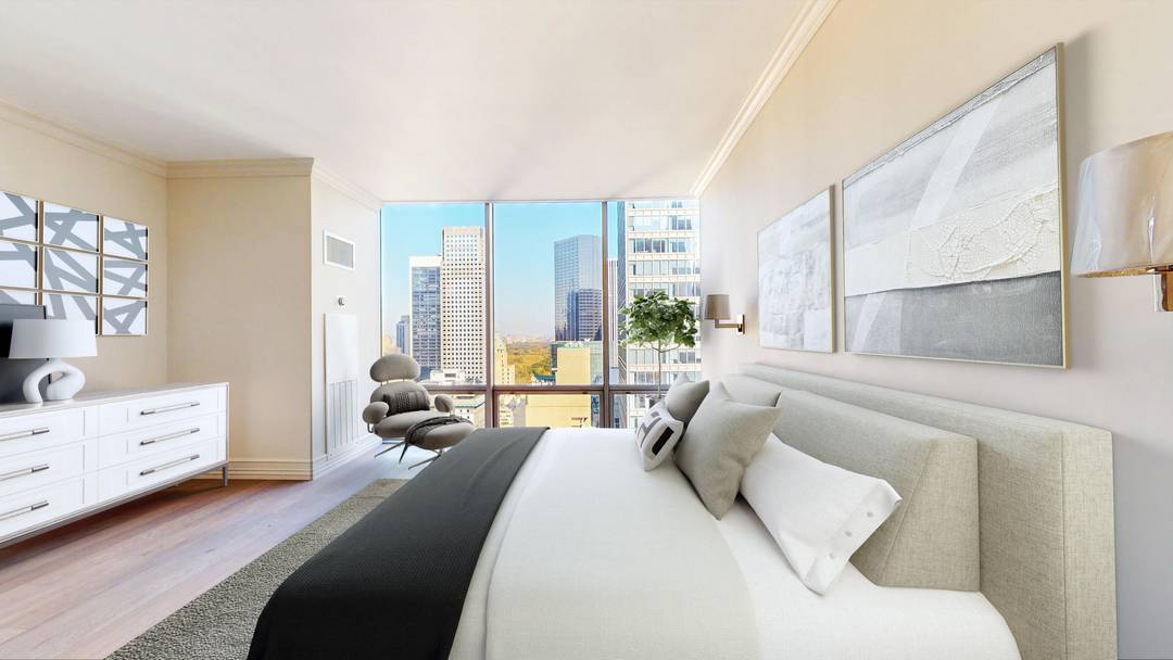 Perched high in the iconic Olympic Tower, this approx.