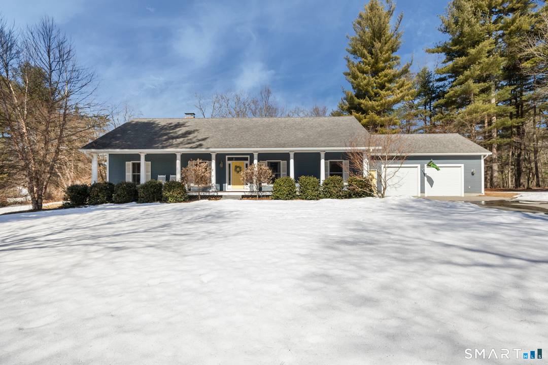 Welcome to 17 Blackwells Landing in the charming town of Brooklyn, Connecticut where privacy, space, and classic New England living come together.