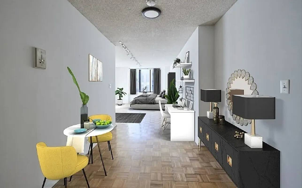Welcome to this spacious alcove studio in the reputed Fifth Avenue Tower Condominium !