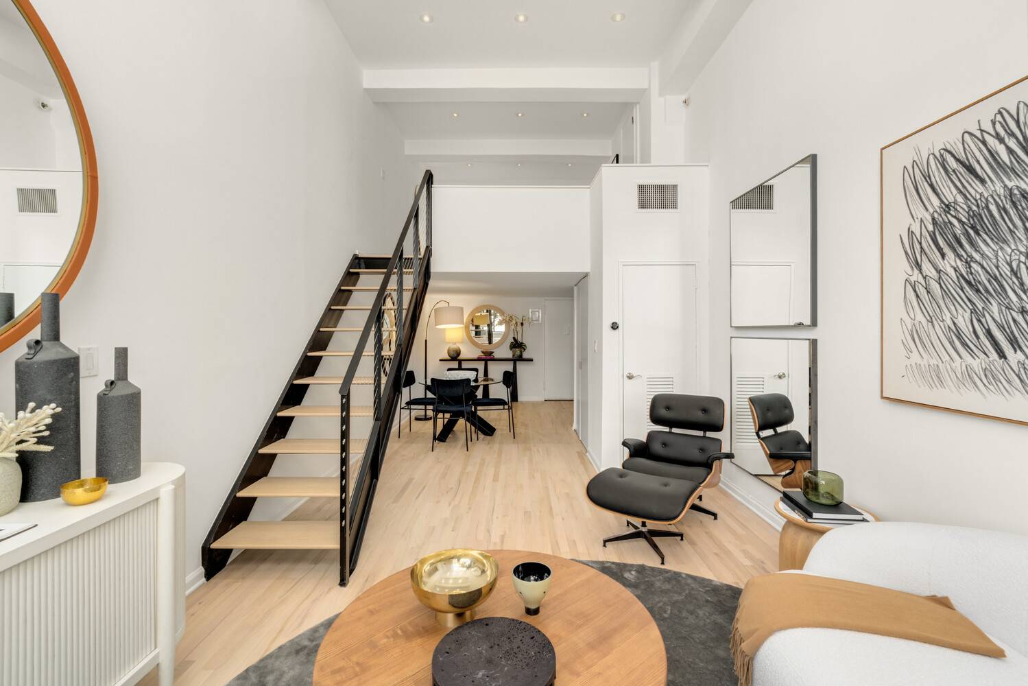Welcome to this stunning duplex loft in the iconic Printing House, a full service luxury condominium in the coveted West Village.