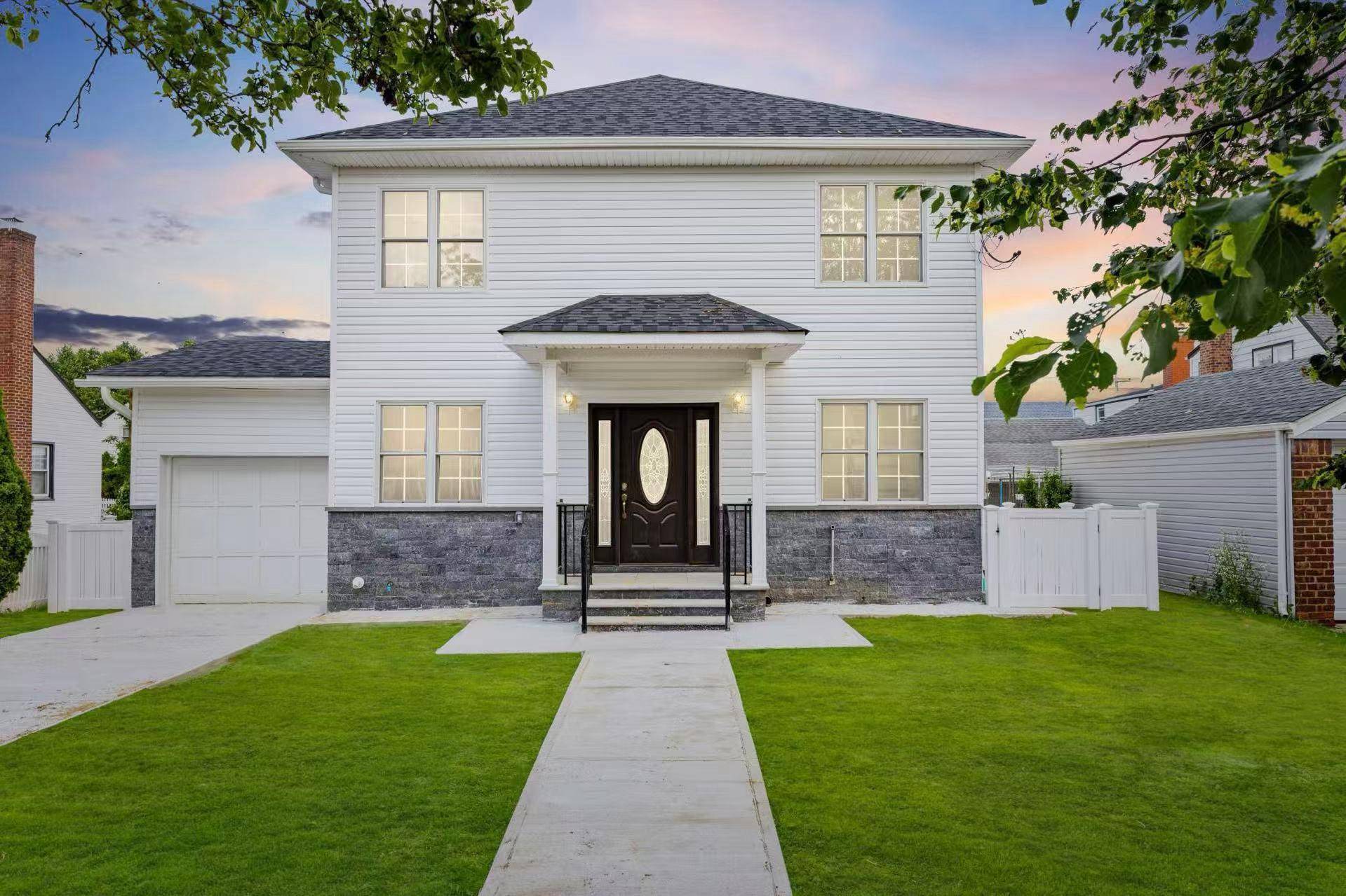 Welcome to this charming home located in the heart of New Hyde Park, offering the perfect blend of modern updates and classic appeal.