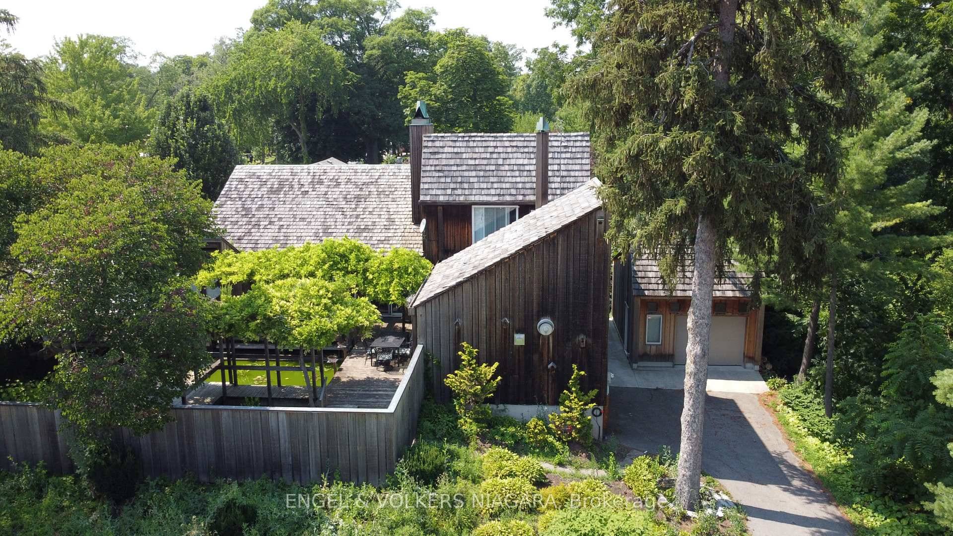 Custom built by artist Campbell Scott, this cedar clad house is totally unique.