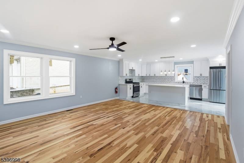 Welcome to 130 Flemington Dr in Parsippany, a completely rebuilt home offering 4 bedrooms, 4 full bathrooms, a fully finished basement with 9 foot ceilings, and modern finishes throughout.