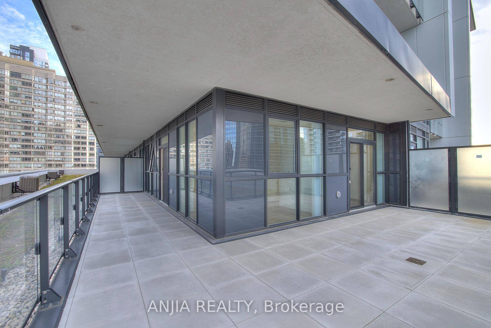 Unique huge terrace surrounding this brand new 2 bedroom unit !