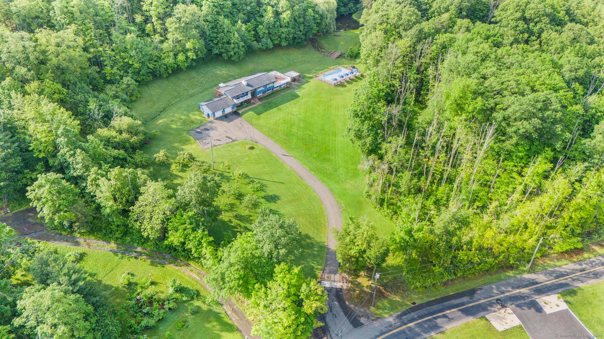 Tucked away on 20. 54 scenic acres, this expansive 5 bedroom, 3.