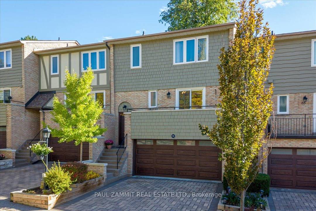 Rarely Available Executive 3 Bedroom Townhouse in Quail Valley Estates, Located in a private enclave, this elegant home offers a serene ravine setting that combines comfort, convenience, and timeless charm.