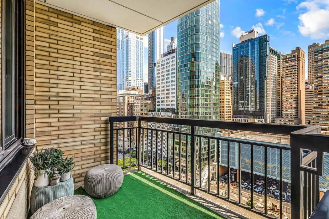 Enjoy stunning city views from the privacy of your own balcony in this charmingly renovated junior one bedroom condo at 99 Battery Place.