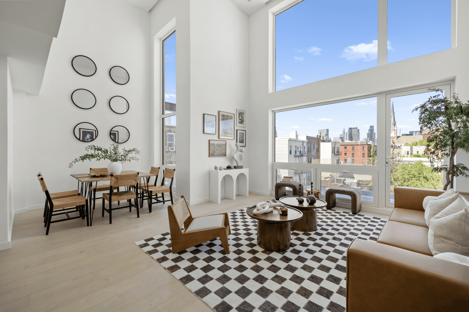 A Light Filled Penthouse Retreat with Three Private Outdoor Spaces and 360 views in PRIME Greenpoint.