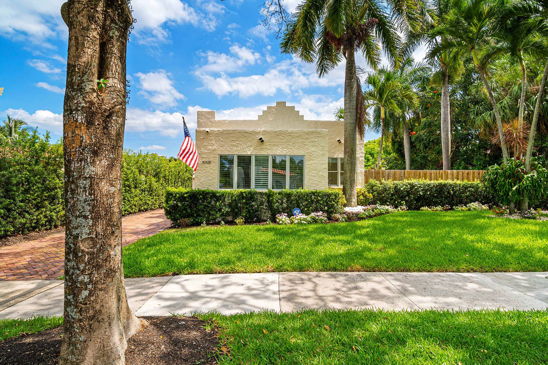 Classic 1920s Spanish Mission on an oversized lot in the heart of Flamingo Park, with not just one but two guest cottages.