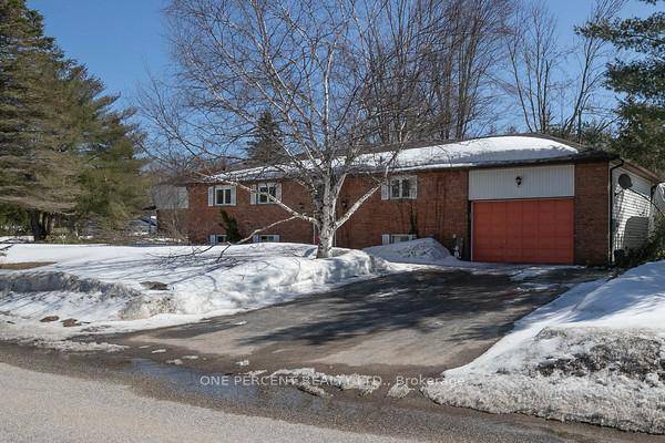 Stunning Raised Bungalow with In Law Suite on a Private Treed Lot !