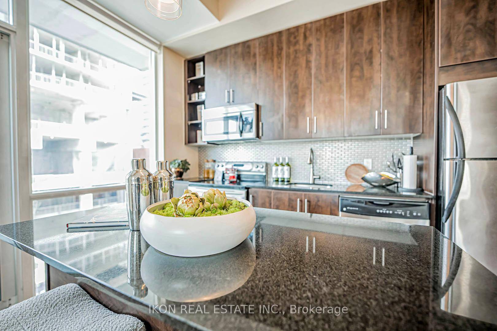 Welcome to Vu Condo. Rarely available Corner unit North East facing unit 840 sq ft unit with 2 balconies and 2 full baths.