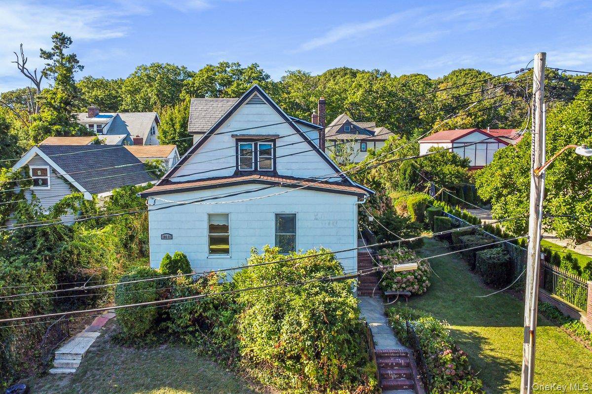 Welcome to this lovely single family home nestled on a quiet, tree lined street in the heart of Jamaica Estates.
