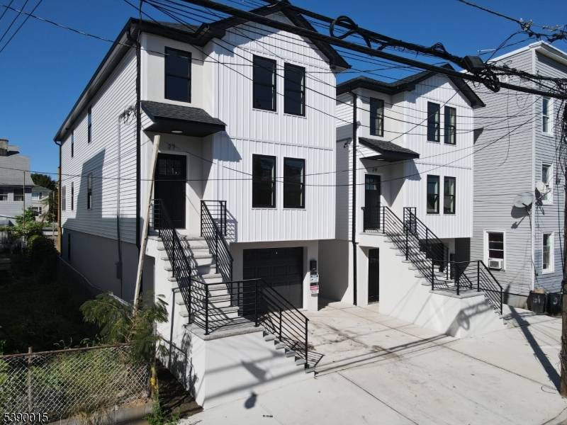 JUST UNPACK IN THIS BRAND NEW 2 FAMILY HOME IN DESIRABLE SOUTH PATERSON SECTION WITH LOW TAXES 5 YEAR TAX ABATEMENT.