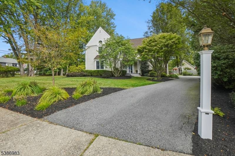 Stunning 3105 SF home located on beautifully landscaped property, close to top rated schools Mendham Borough's downtown historic district.