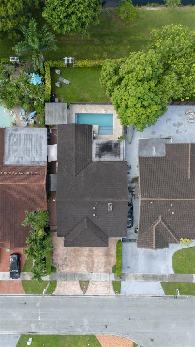 Located in Miami, this updated 4BR 2BA single family pool home delivers the trifecta no HOA, new roof, and new A C.
