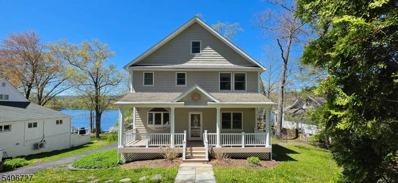 Are you looking for a 4 bedroom 4 full bath lakefront home on the eastern shores of Greenwood Lake in a private lake community with public utilities, private beach, clubhouse, ...
