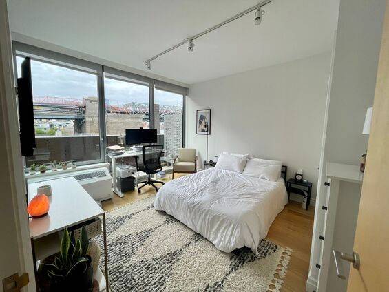 South facing beautiful 1 bedroom with private balcony, w d in unit and open kitchen.