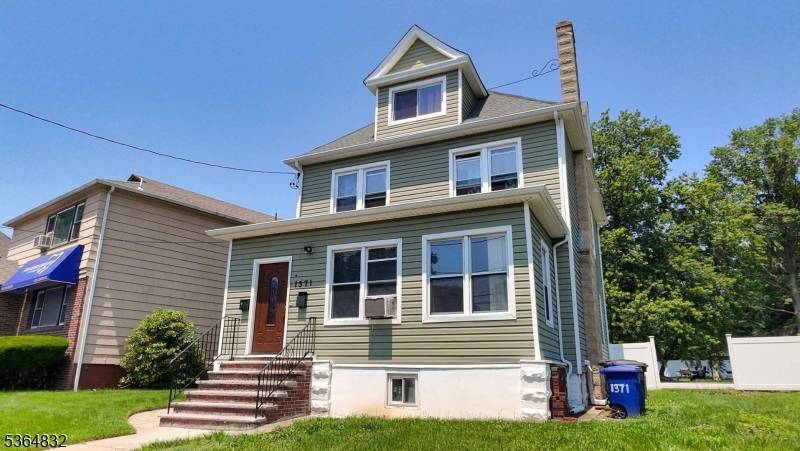 Spacious and conveniently located with an oversized backyard, this income generating home is a must see.