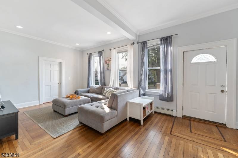 Spacious two family home in the desirable Hilton neighborhood of Maplewood.