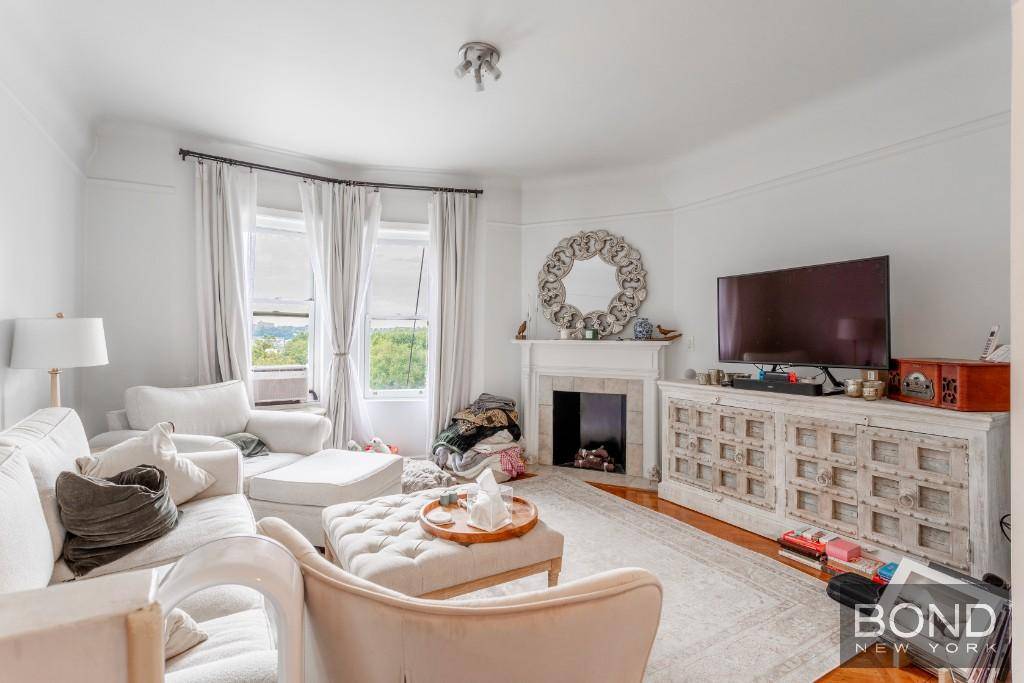 Here's a fantastic 2 Bedroom with a charming living room, a fully loaded separate kitchen, central hallway and full bath with tub and shower in a classic elevator building right ...