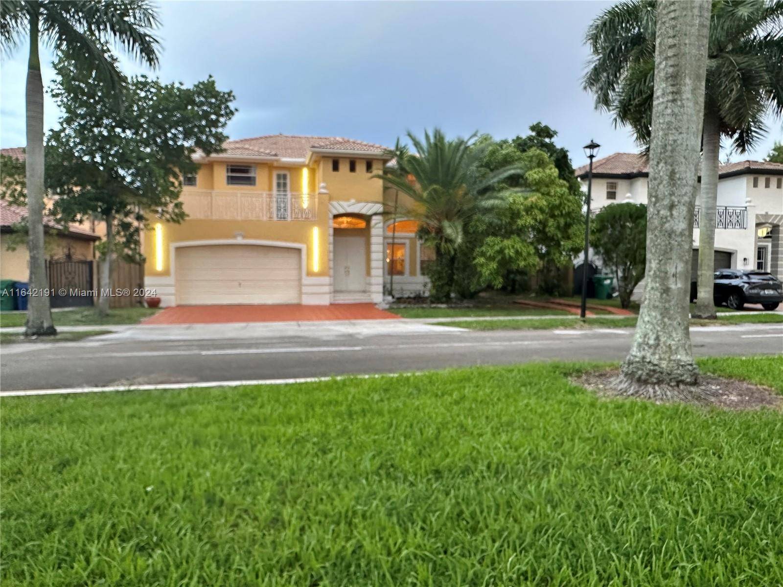 Elegant Simple Mediterranean style Masterpiece With Studio Apartment in Century Lakes West Kendall.