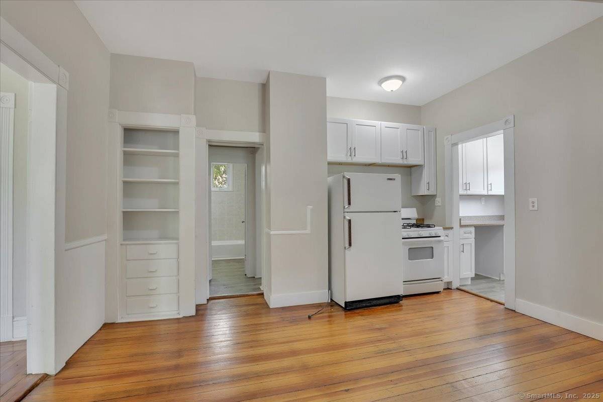 Recently renovated 2 family property on a corner lot at 94 Bassett Street in New Britain, offering a turn key investment opportunity.