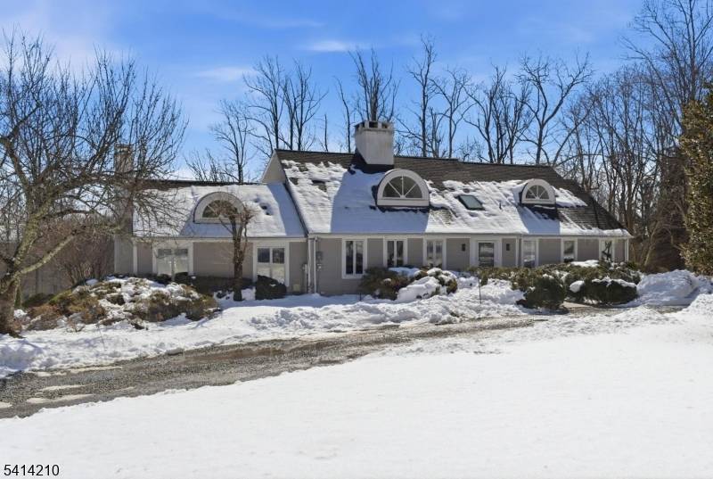 Set on 3. 9 picturesque acres with a private pond in sought after Harding Township, this beautifully renovated custom home blends timeless character with thoughtful modern updates.