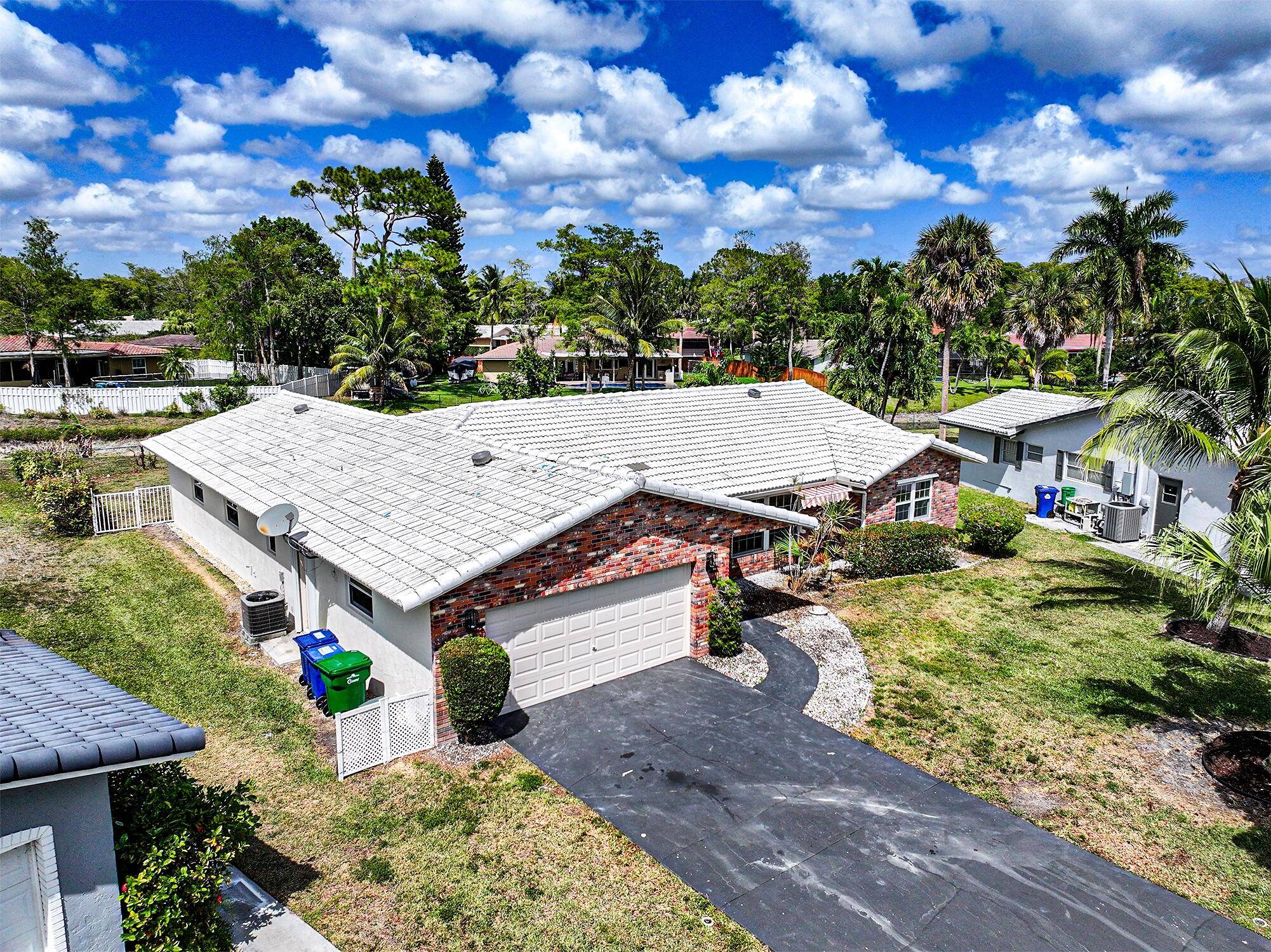 Welcome to your new home set on a large, private, fenced waterfront lot offering both tranquility and security.