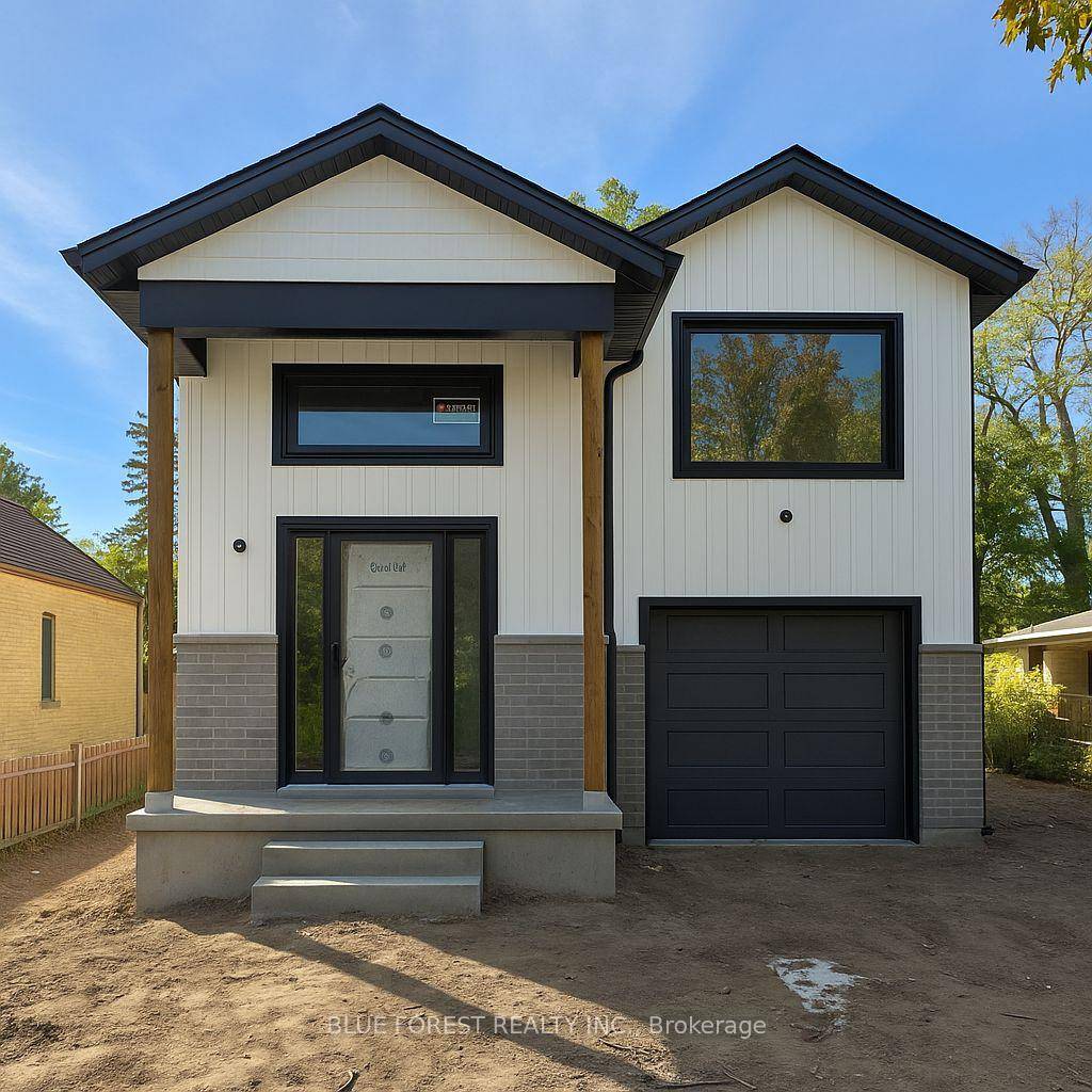 Welcome to this stunning modern raised bungalow crafted by Liersche Custom Homes !