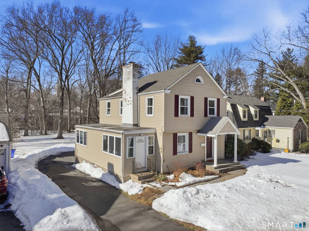 Location, space, and classic West Hartford charm come together at 1129 Trout Brook Drive.