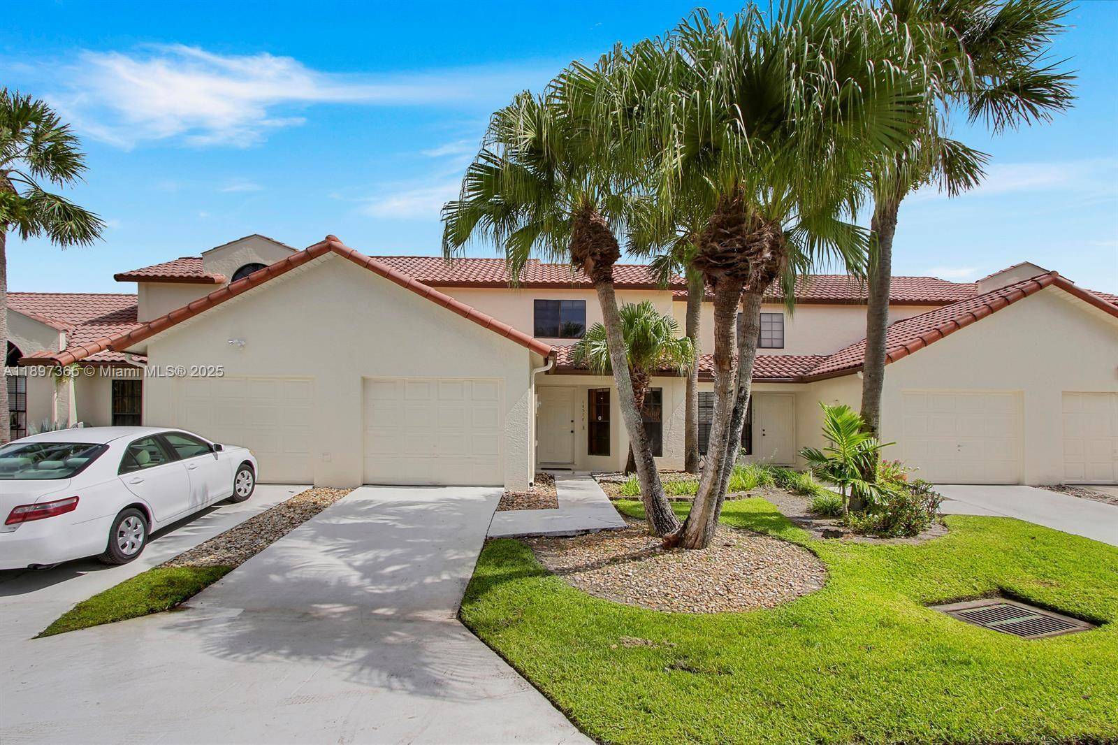 Spectacular, fully renovated 2BR 2BA townhouse located in the exclusive community of Lakes of Boca !