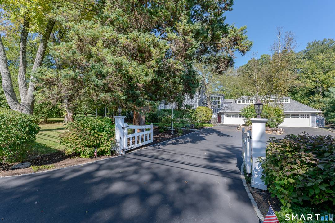 Timeless and charming antique home, thoughtfully expanded and updated for today's lifestyle, offering over 5, 000 sq ft of beautifully finished living space.