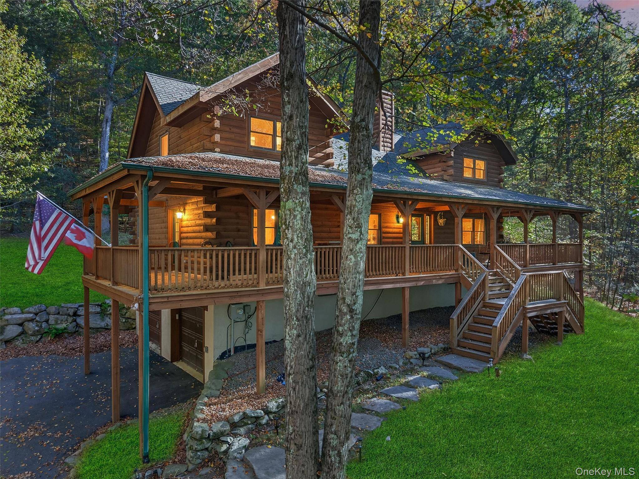 Remarkable Private Retreat 8 Acres with Custom 3 Story Log Cabin in Warwick.